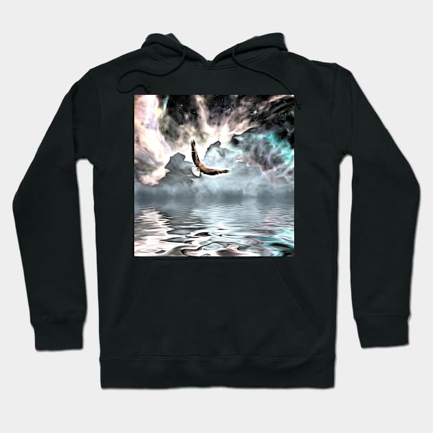 Eagle flies above water surface Hoodie by rolffimages